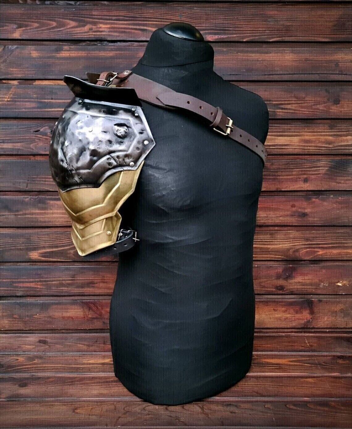 Fantasy warrior shoulder armor, blackened and golden shoulder